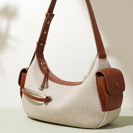 Damen-Handtasche aus zweilagigem Rindsleder im Baumwolldesign mit besonderem Interesse