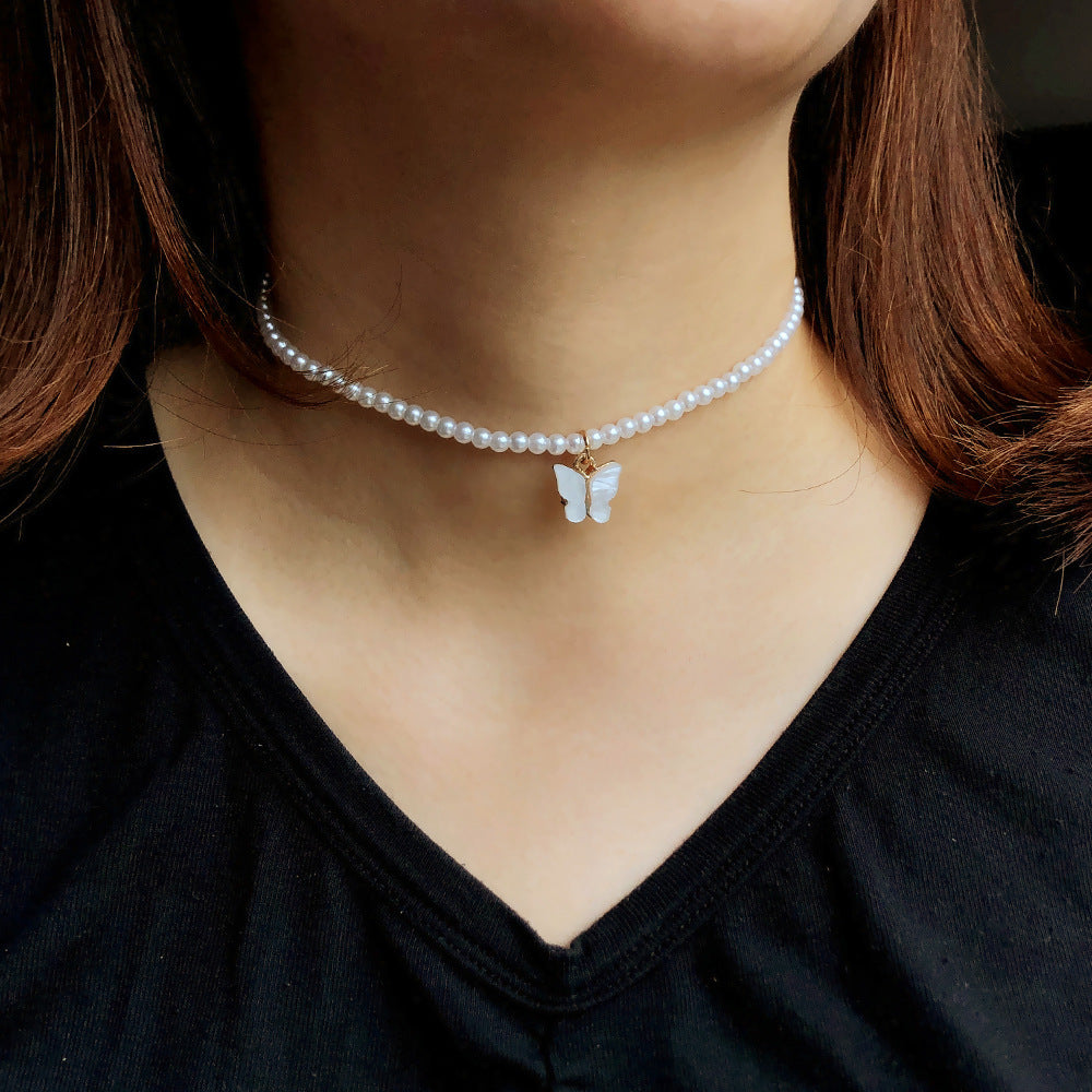 Elegante weiße Perle Choker kleine runde Perle Hochzeit Schmetterling Halskette