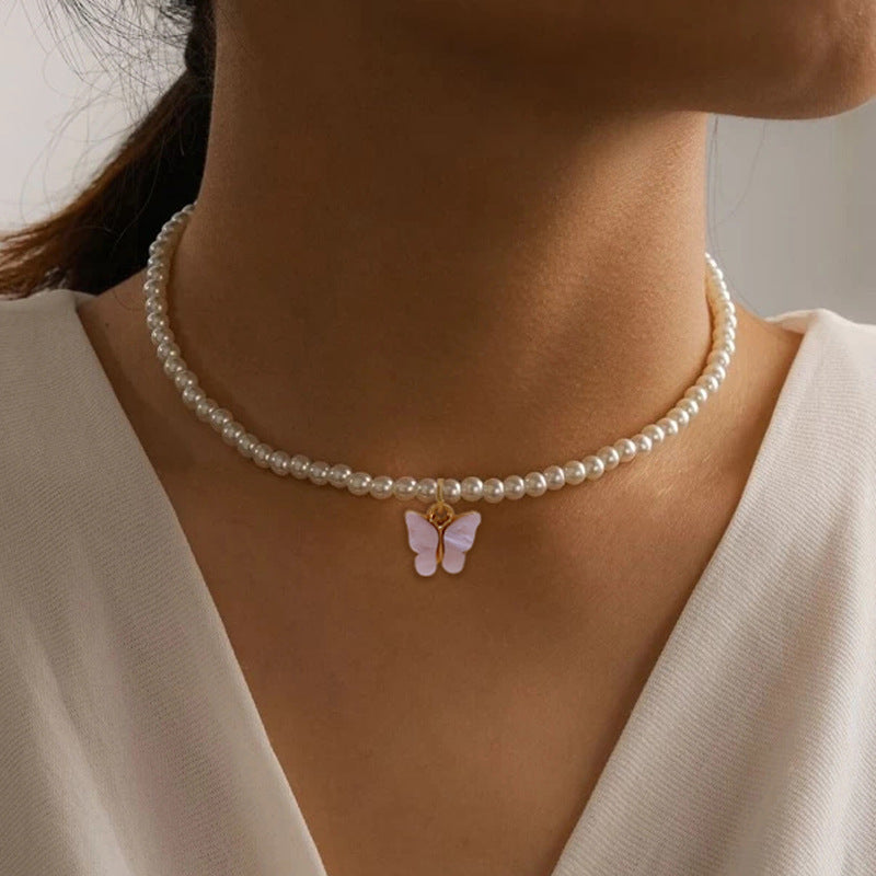 Elegante weiße Perle Choker kleine runde Perle Hochzeit Schmetterling Halskette