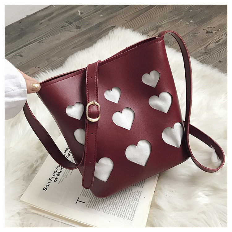 Hollow small peach heart bucket bag
