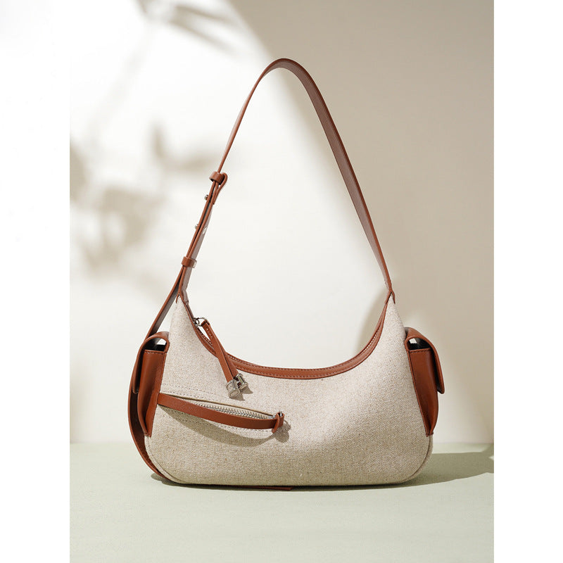 Damen-Handtasche aus zweilagigem Rindsleder im Baumwolldesign mit besonderem Interesse