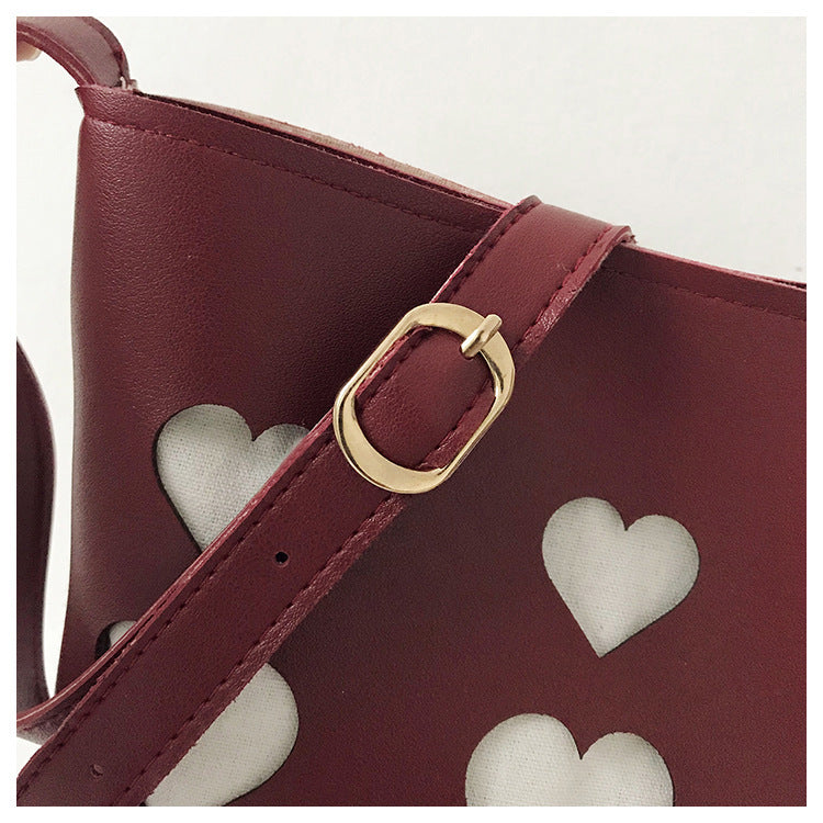 Hollow small peach heart bucket bag