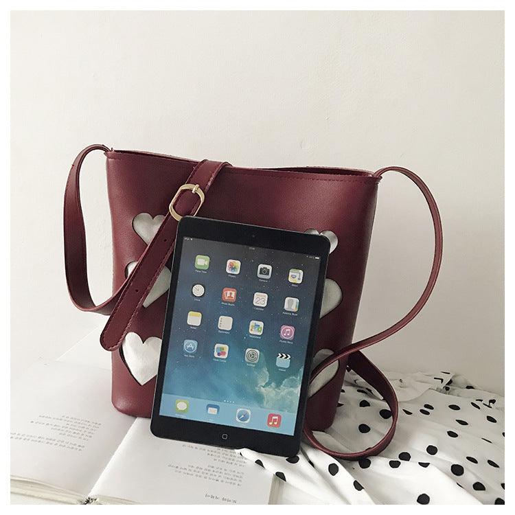 Hollow small peach heart bucket bag