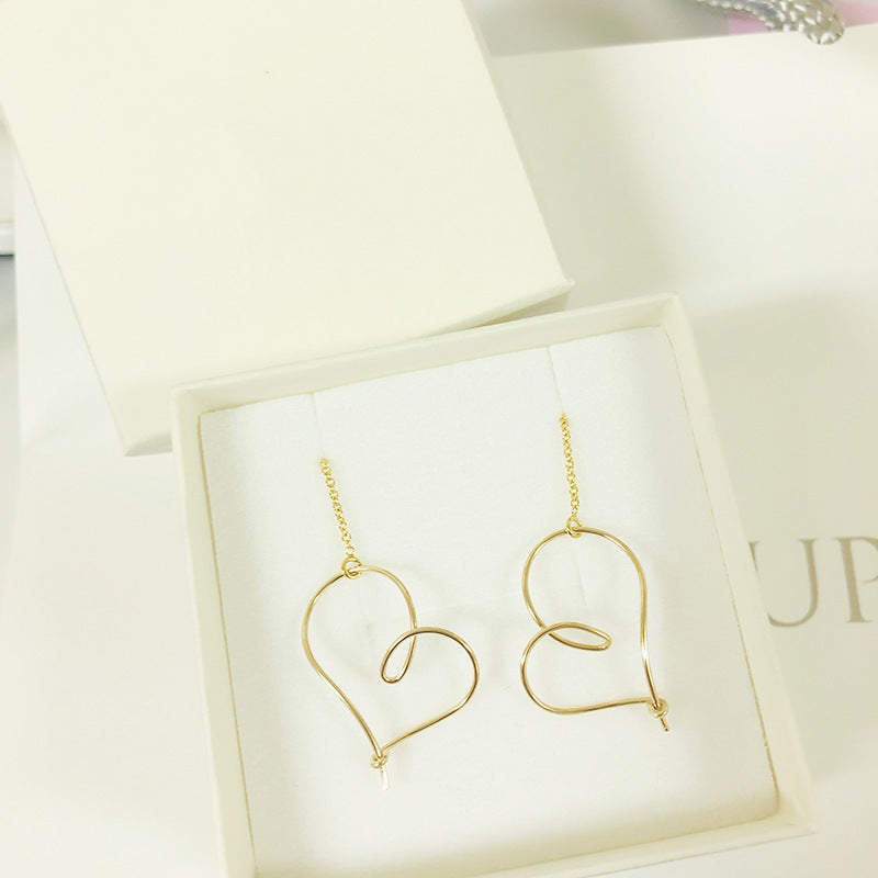 18k gold hollow heart earrings
