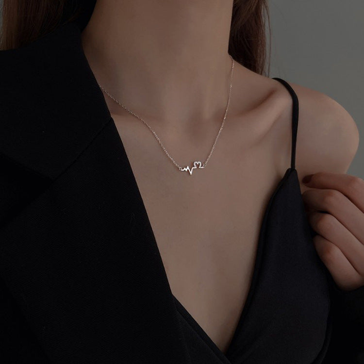 Sterling Silver Hollow Love Heart Beating