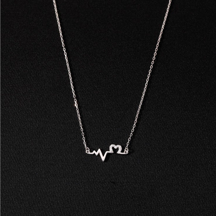 Sterling Silver Hollow Love Heart Beating