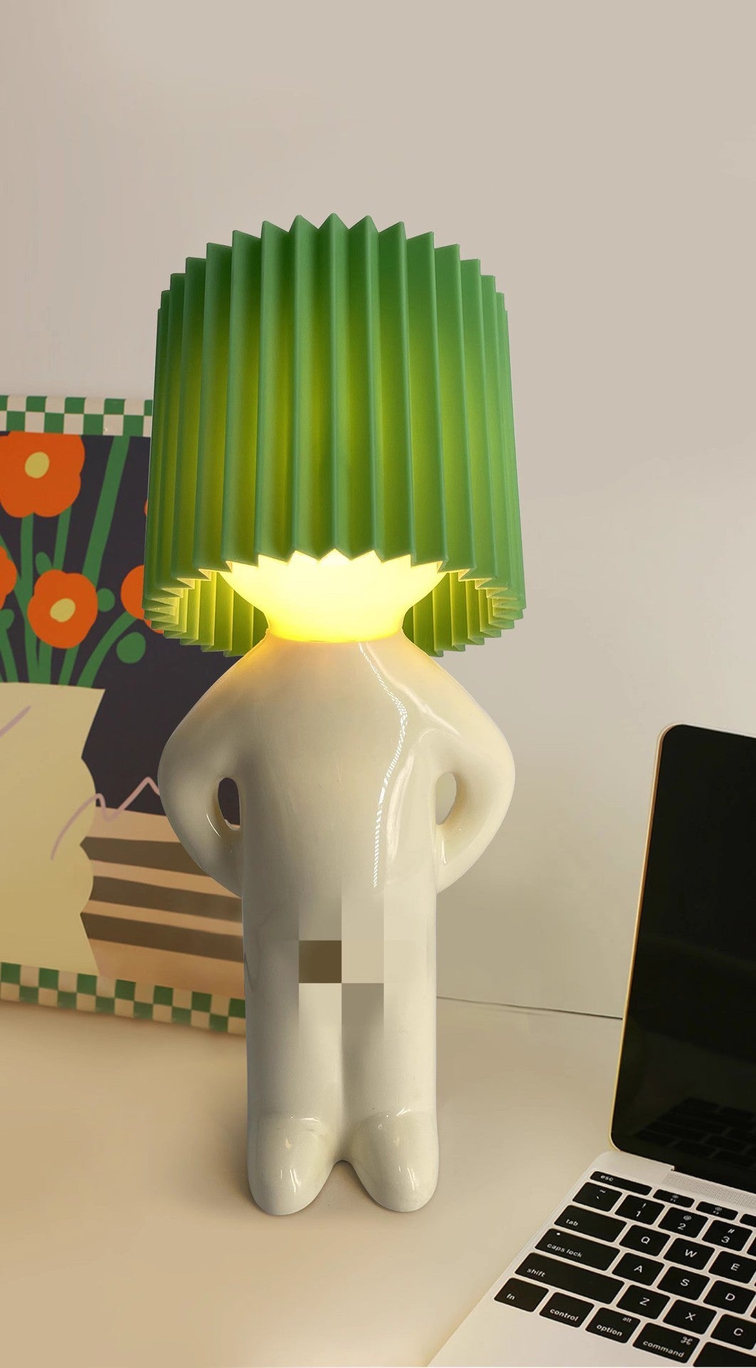 Shy little boy reading lamp