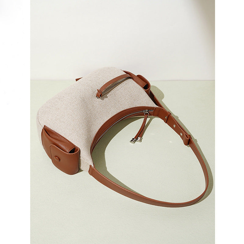 Damen-Handtasche aus zweilagigem Rindsleder im Baumwolldesign mit besonderem Interesse