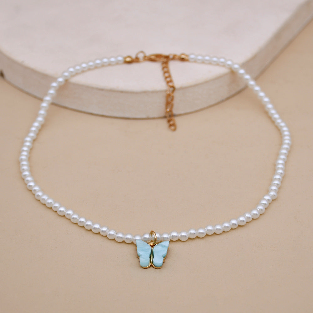 Elegante weiße Perle Choker kleine runde Perle Hochzeit Schmetterling Halskette
