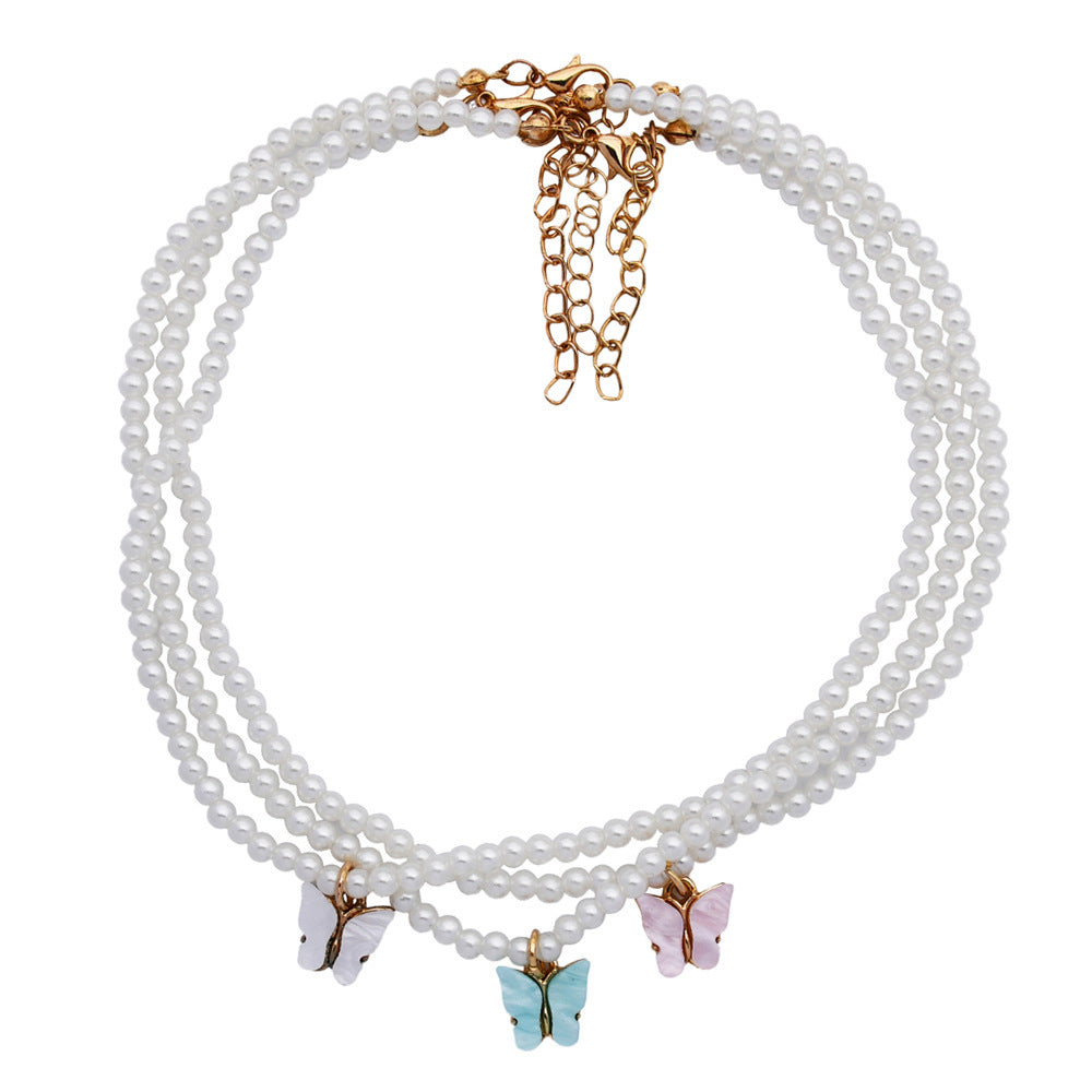 Elegante weiße Perle Choker kleine runde Perle Hochzeit Schmetterling Halskette
